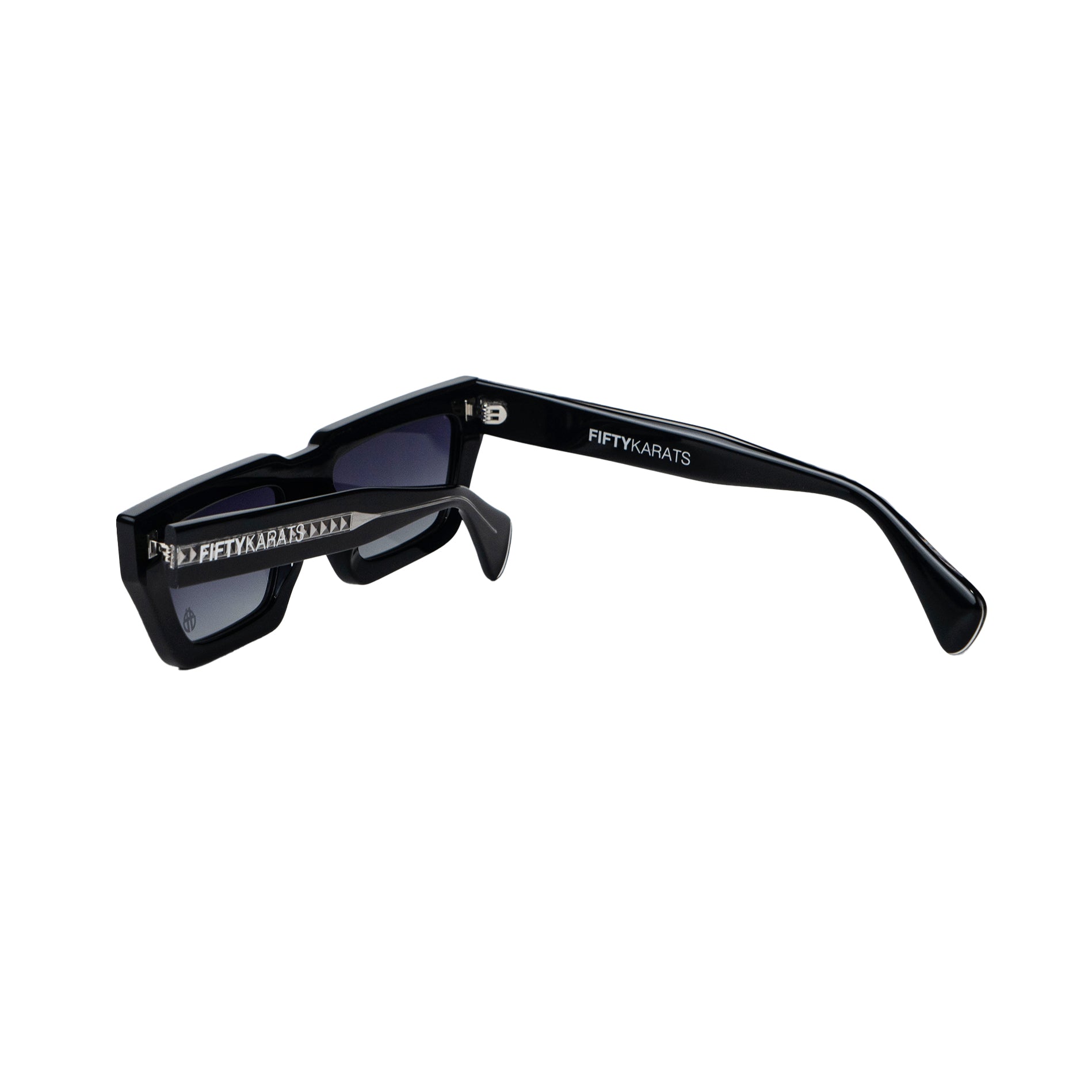 Conductor Sunglasses Side Folded with Beetle Icon logo on lens and Fifty Karats logo on arm