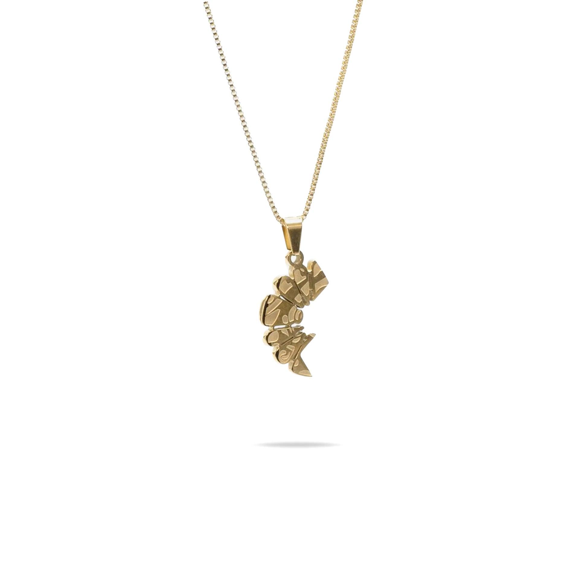 Haloe Blü’s Half Haloe Pendant, designed by Carelaa™ and Twelve’Len™. Finished in 18k gold plating, this pendant delivers a bold yet refined look. Paired with a matching gold-plated necklace.