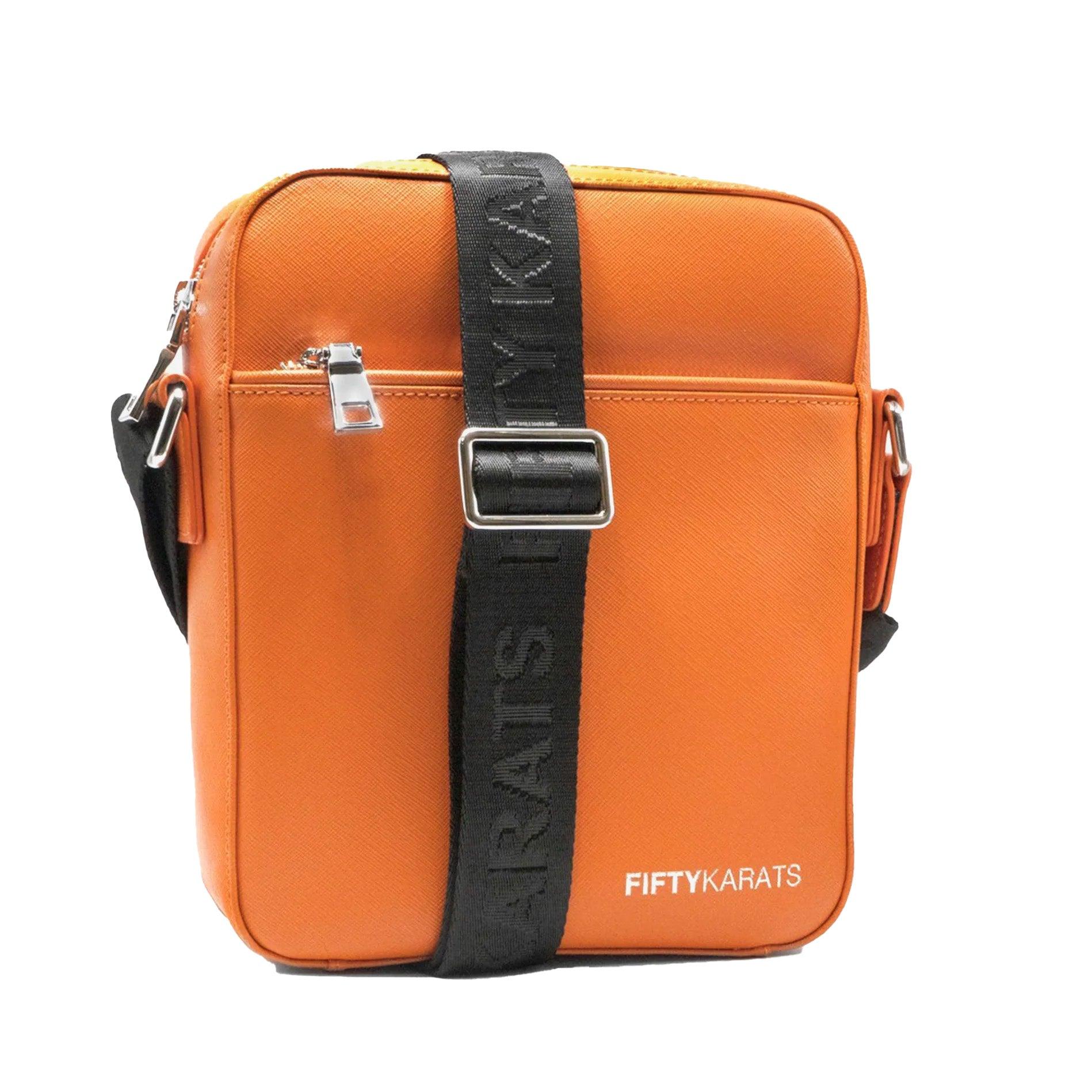 Orange Fifty Karats Explorer Messenger Bag Front with Fifty Karats logo on bottom corner